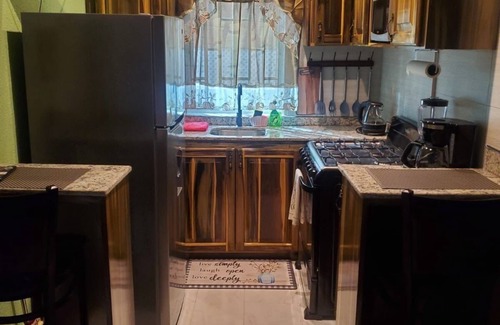 Spanish Town Apartment | Serenity Oasis Apartment