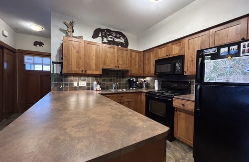 Sun Peaks Condo | Settler’s Crossing- 2 bdrm Ski In/Out, Private Hot Tub, BBQ and Heated Garage