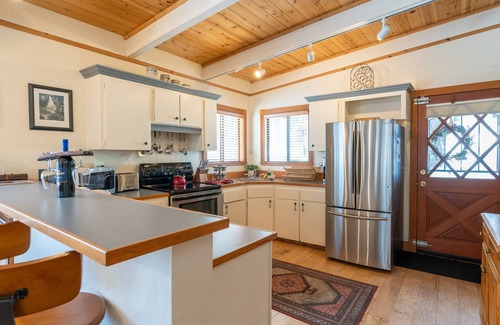 Country Club Estates House | Shady Pines: Cozy Cabin w/Hot Tub, Forest Views, & Pet-Friendly