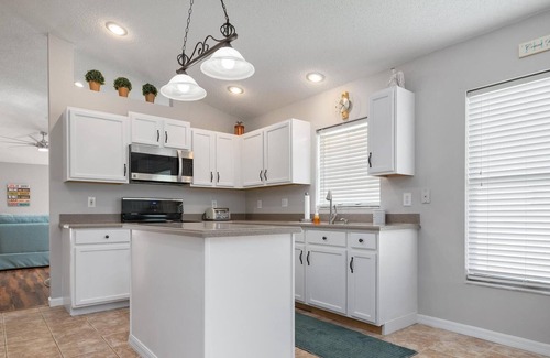 Sabal Harbour House | ⚓Shangri La Retreat! Lakefront private pool home w/bright, tropical design!⚓🌅
