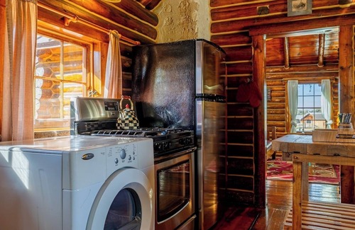 Shell Cabin | Shell Town Cabin- Log cabin located at the base of the Big Horn Mountains, gas fireplace
