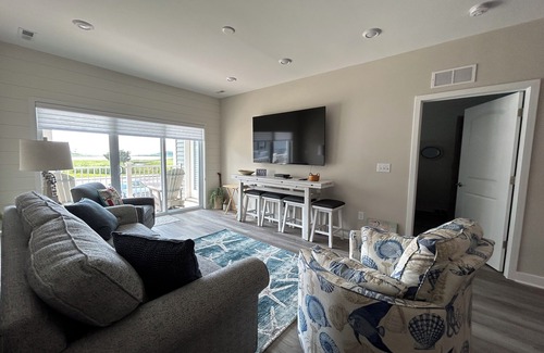 Rehoboth Beach Condo | Shore Beats Work II-nestled on Love Creek in Lewes. Renew, Relax, & Rediscover.