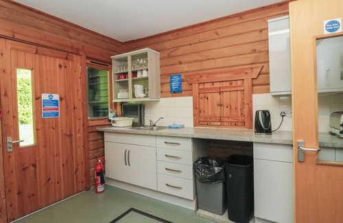 Brodick Cottage | SHORE LODGE BRODICK CASTLE, pet friendly, with open fire in Brodick
