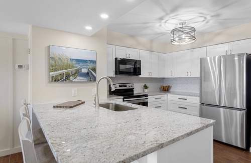 Sunnyside Condo | Shoreline Villas 9 - Updated Gulf-Front Condo, Near Pier Park, Seasonal Rentals!