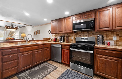 Patton Condo | Shores Lakefront Condo - Lakefront Condo, Walk to Village, Dock, Pool