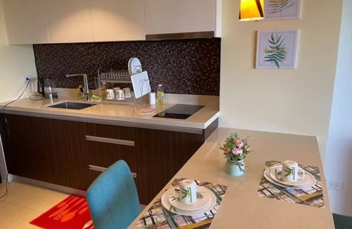 Maribago Condo | Side-by-side Luxury at Tambuli Resort for families. Wifi, Pool, Discount Passes