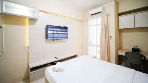 Surabaya Apartment | Simple and Comfortable Living Studio at Bale Hinggil Apartment By Travelio