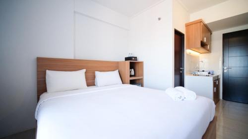Sidoarjo Apartment | Simple and Comfortable Studio Apartment at Suncity Residence By Travelio