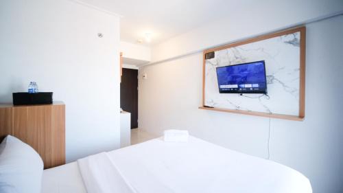 Sidoarjo Apartment | Simple and Comfortable Studio Apartment at Suncity Residence By Travelio