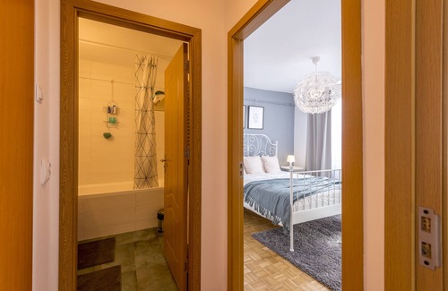 Cluj-Napoca Apartment | Simple white top floor apartment close to old town