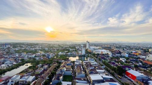 Panakkukang Apartment | Simply and Cozy Living Studio Vida View Makassar Apartment By Travelio