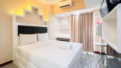 Panakkukang Apartment | Simply and Cozy Living Studio Vida View Makassar Apartment By Travelio