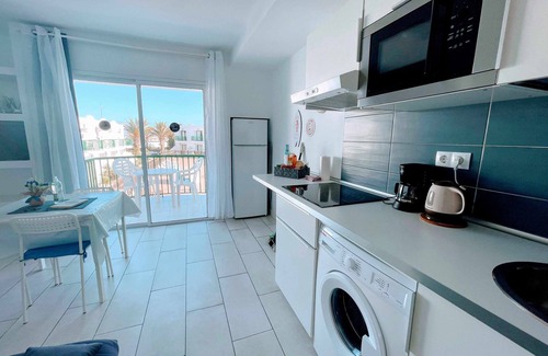 Corralejo Apartment | Sinfonia Pool View & WiFi by iRent Fuerteventura
