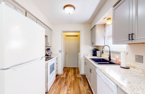 Stillwater House | Single-level home near OSU campus with fenced yard, patio, & grill