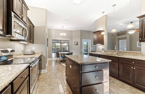 Navarre House | Single-level home with pool, enclosed yard, screened lanai, grill & home office