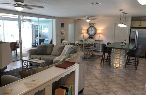 Singer Island House | Single open-concept home one block from the ocean with heated pool and lanai