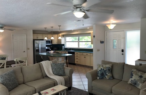 Singer Island House | Single open-concept home one block from the ocean with heated pool and lanai