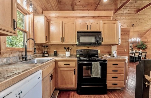 Gatlinburg - Pigeon Forge Cabin | Sip your coffee in the rocking chairs while enjoying the serene Mountain View’s.