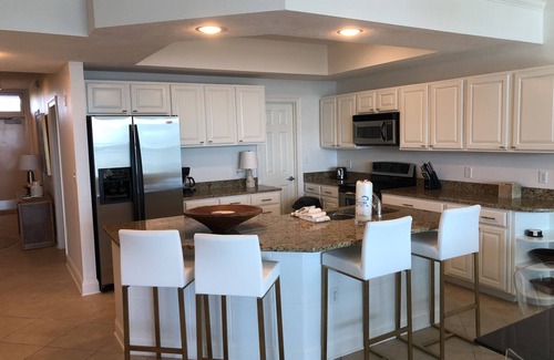 Orange Beach Condo | Sit back and watch the boats pass through on the intercoastal!