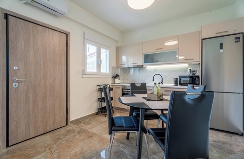Nikita Apartment | SithoniaRS Alfi Luxury Ground Floor Apartment with Private Garden