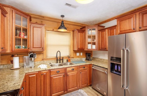 Snowshoe House | Ski-in and out with private HOT TUB in 5 bedroom house with game/theatre room!