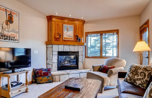 Four O'Clock Condo | Ski-in/out condo next to Snowflake Lift with fireplace, hot tubs, sauna & gym