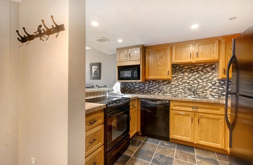 North Park City Condo | Ski-in/out condo with WiFi, private hot tub, fireplace, shared pool, & gym