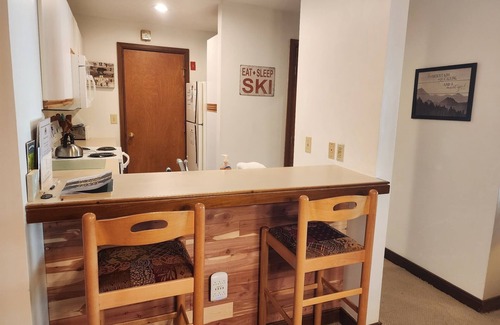 West Dover Condo | Ski-in/ski-out condo w/deck, wood-burning fireplace, wifi, community amenities