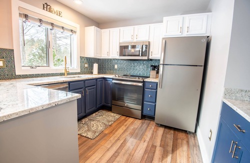 Boyne City Apartment | Ski-in/ski-out Disciples Village Condo | Gas Fireplace | 5 BR | Sleeps 18!