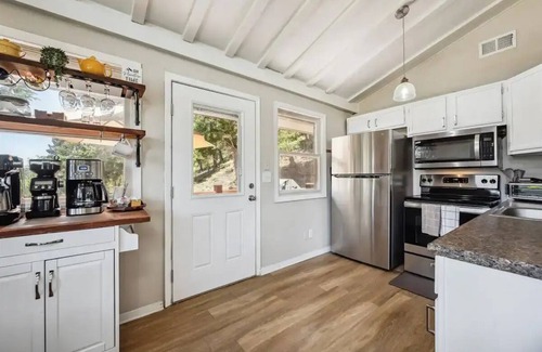 Evergreen House | Sky Mountain Retreat. Escape to the serene winter beauty of Evergreen, Colorado