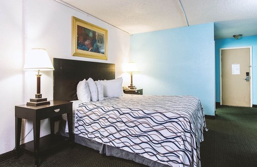Wichita House | Sky-Palace Inn & Suites Wichita East - 1 King Bed Suite Smoking Oversized