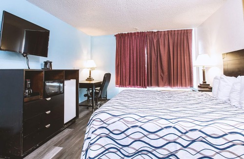 Wichita House | Sky-Palace Inn & Suites Wichita East - 1 King Bed Suite Smoking Oversized