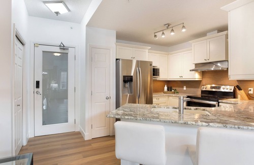 Beltline Apartment | Skyline Loft | 2BR, 2BA with 2 Balconies + BBQ | Sleeps 8 | Tower Views & Fire