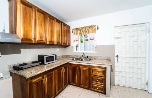 Montego Bay Apartment | Skyline Suites, Breathtaking Mountains & City View 1 Bedroom Apts by RedAwning