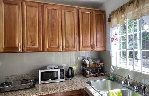 Montego Bay Apartment | Skyline Suites, Breathtaking Mountains & City View 1 Bedroom Apts by RedAwning