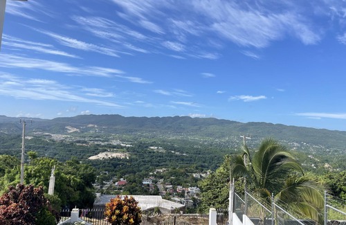 Montego Bay Apartment | Skyline Suites, Breathtaking Mountains & City View 1 Bedroom Apts by RedAwning
