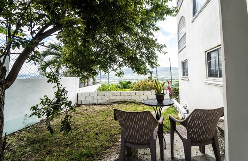 Montego Bay Apartment | Skyline Suites, Breathtaking Mountains & City View 1 Bedroom Apts by RedAwning