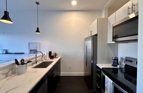 Milwaukee Apartment | Skywalk to Fiserv Studio Apt with Rooftop, Gym, and Parking
