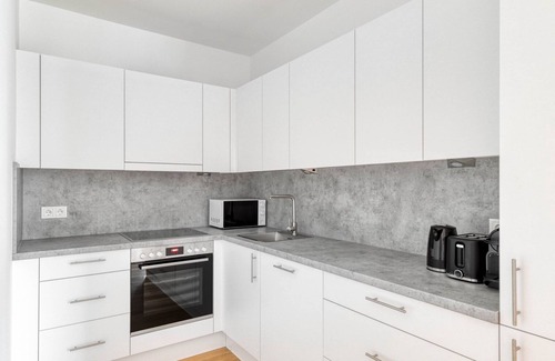 Vienna Apartment | Sleek Marinatower 2BR w/Gym & Elevator, nr metro U2, by Blueground