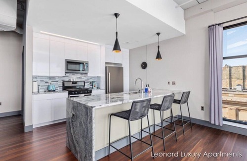 Nelson Apartment | Sleek Modern Corner Luxury Apartment with Water/City Views - Leonard Luxury