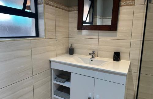 Parow North Apartment | Sleek Modern Luxury Pool Side Apartment