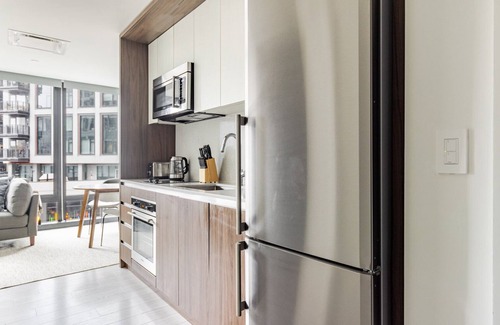 Seaport District Apartment | Sleek Seaport Studio w/Gym & W/D, nr Restaurants, by Blueground