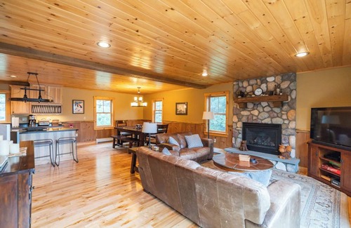 Sunday River Area House | Sleeps 19, A/C, Fire Pit, Hot Tub, Deck, Grill, Swimming Nearby!