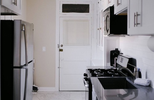 Irving Park East Apartment | Sleeps 7 Huge Projector Designated Workspace