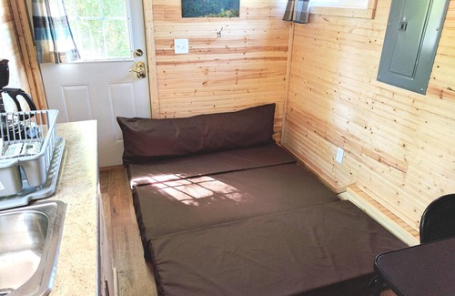 Lansing Hotel | Sleeps up to 2, electric, water, kitchenette, full bathroom, air conditioned/heated.