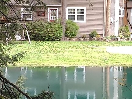Dushore House | Sleepy Hollow Lodge pond front retreat with water views from every window