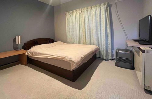 Obihiro House | Slow and luxurious time/bedroom 1 in riverside, 10 minutes drive from Obihiro station.
