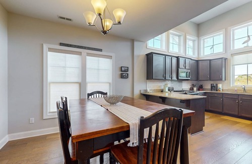 Caswell Beach House | Slowin' Dune | Lavish Island Getaway with Golf Cart Near Beach, Golf, & Dining