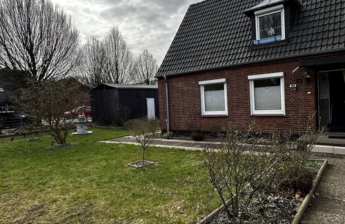 Heide House | Small, cozy semi-detached house on a large plot