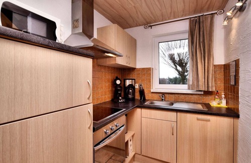 Wibrin House | Small, simple and reasonably priced semi-detached house with its own terrace